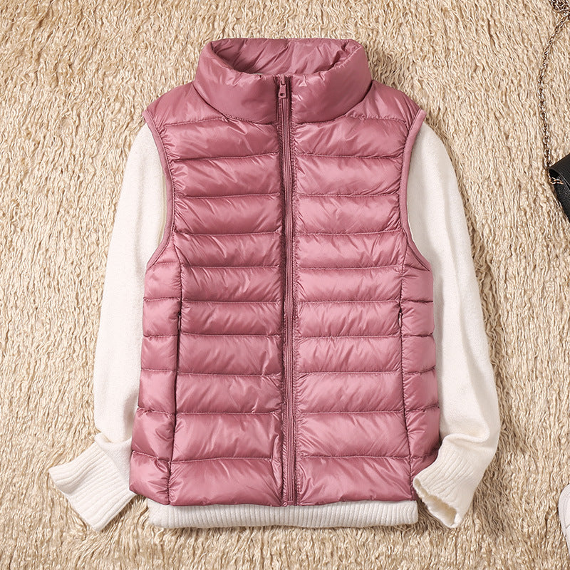Galora | Ny vest med hvide andefjer
