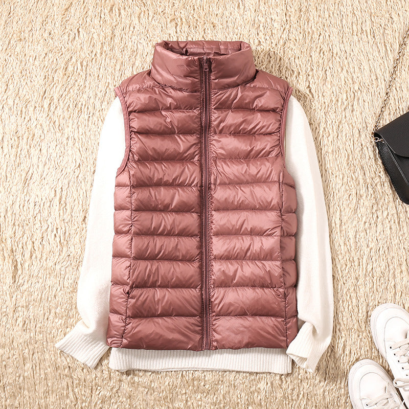 Galora | Ny vest med hvide andefjer